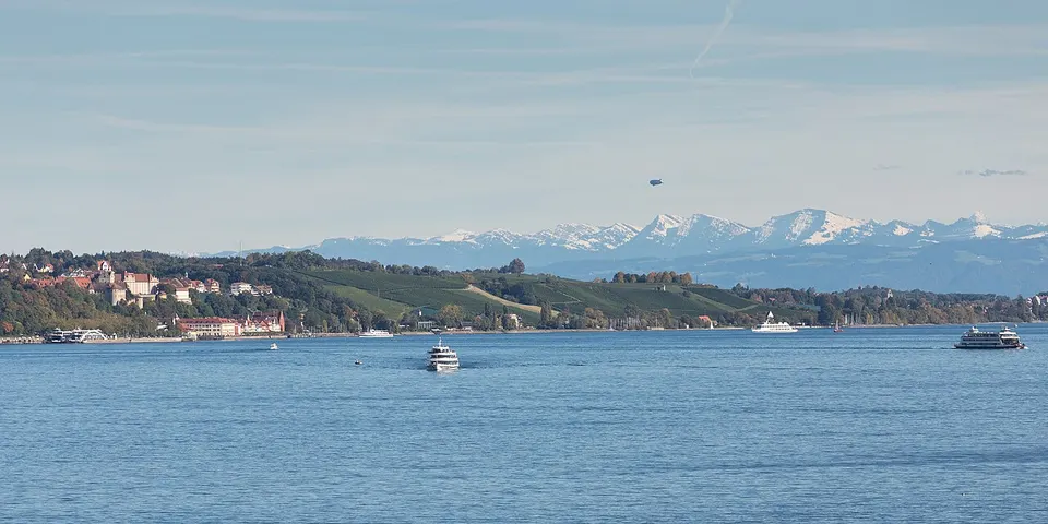 Bodensee: Lake Constance, Meersburg, busy boat traffic, the Zeppelin and the Nagelfluh mountain range in the Allgäu