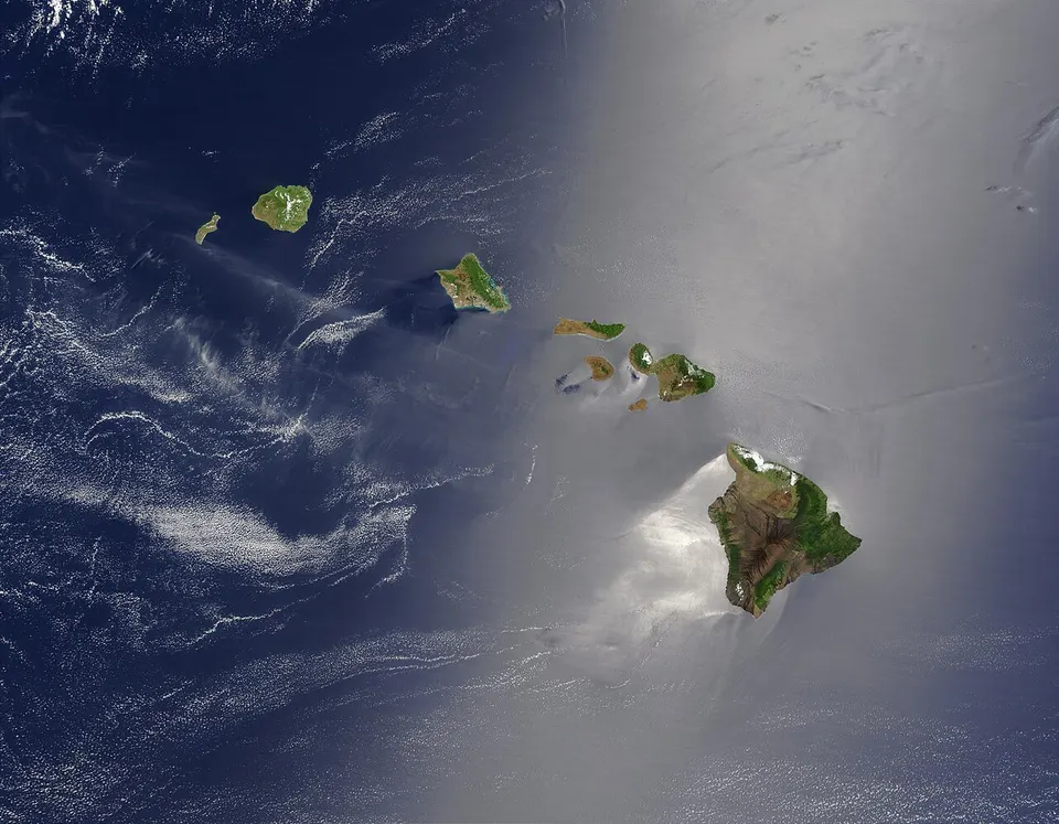 Hawaii: Satellite view of Hawaii archipelago (USA) Original description from NASA: "A silver swath of sunglint surrounds half of the Hawaiian island